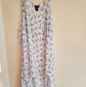 White  with poison bottle print sheer top